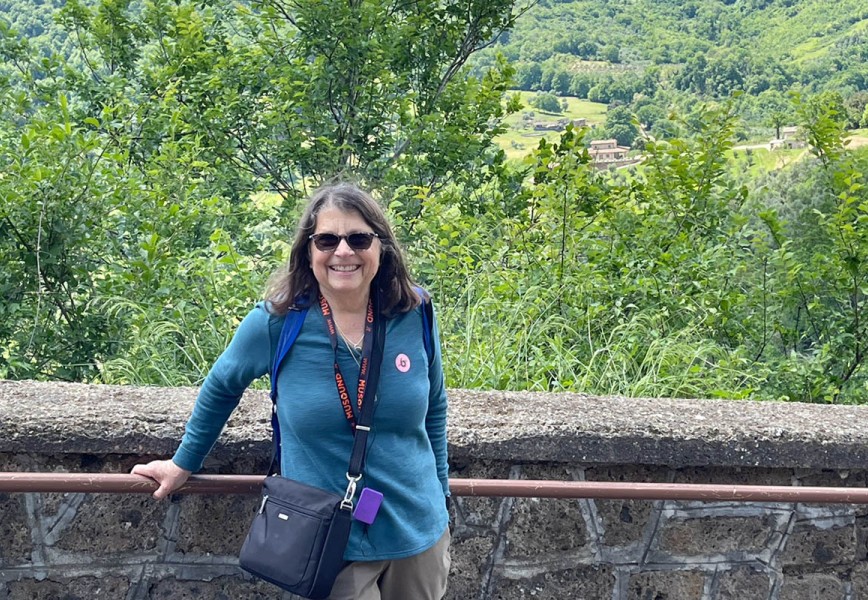 Sandy Bornstein taking a break while walking down from the Civita di Bagnoregio