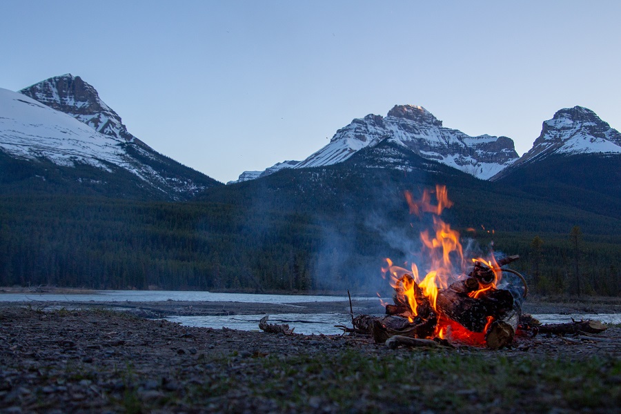 Bonfire near mountain in British Columbia, Canada.